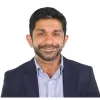 Dr. Aziz Bhimani
